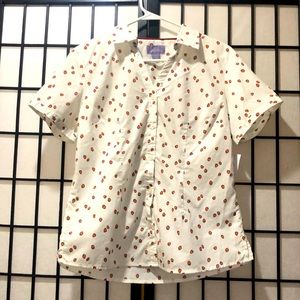 A strawberry printed button up. Never been worn